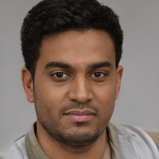 Neutral black young-adult male with short  brown hair and brown eyes