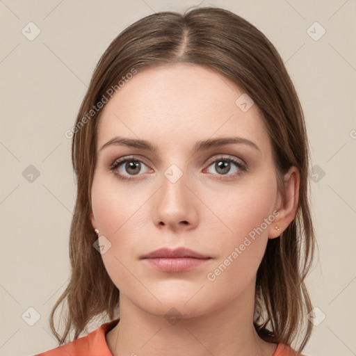 Neutral white young-adult female with medium  brown hair and grey eyes