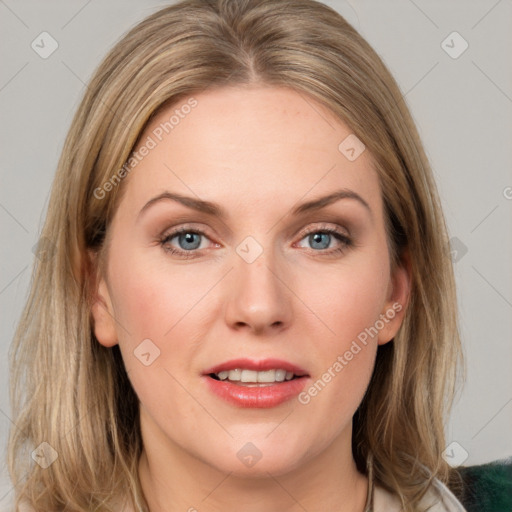 Joyful white young-adult female with medium  brown hair and blue eyes