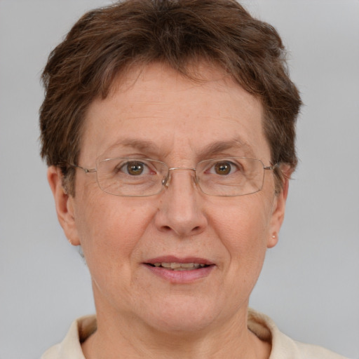 Joyful white middle-aged female with short  brown hair and brown eyes