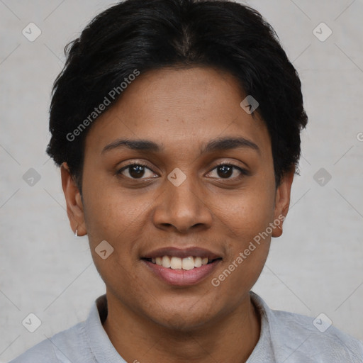 Joyful black young-adult female with short  black hair and brown eyes