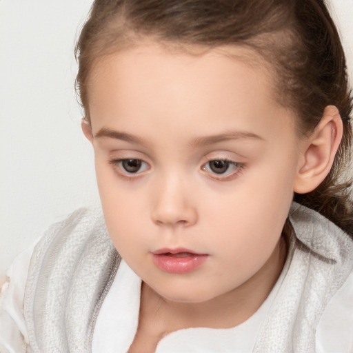 Neutral white child female with medium  brown hair and brown eyes