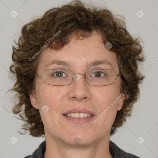 Joyful white adult female with medium  brown hair and blue eyes