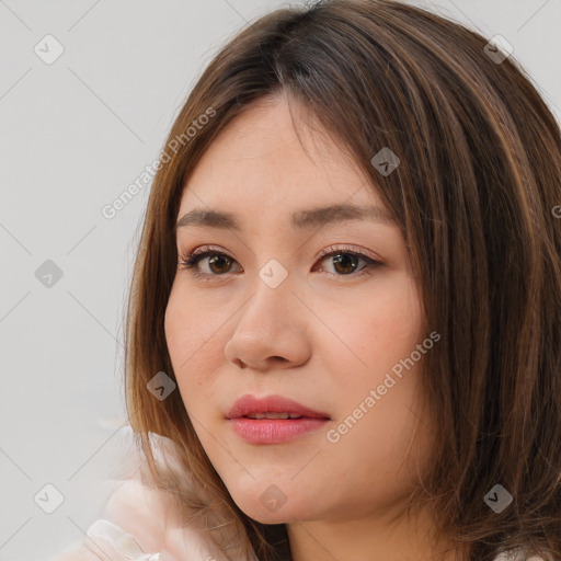 Joyful white young-adult female with medium  brown hair and brown eyes