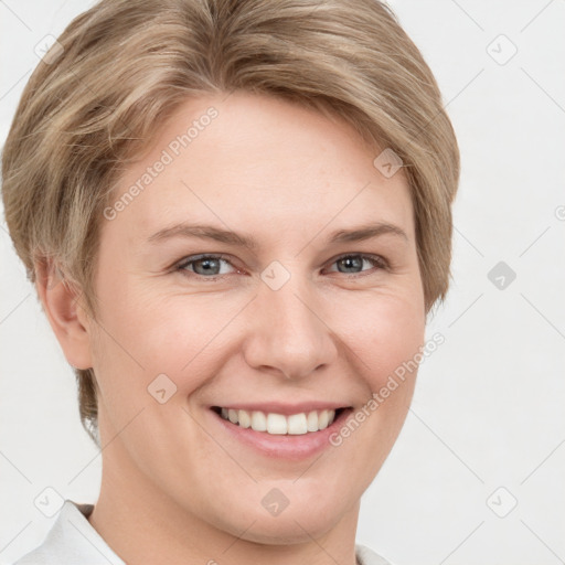 Joyful white young-adult female with short  brown hair and grey eyes