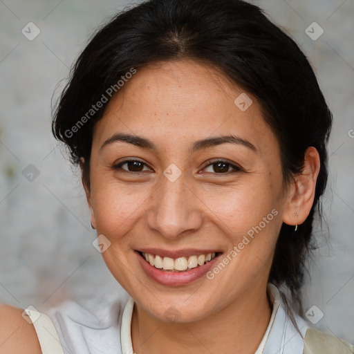 Joyful white adult female with medium  brown hair and brown eyes