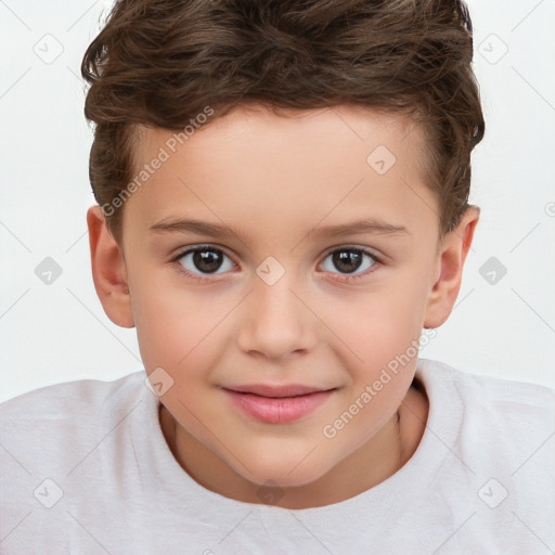 Joyful white child male with short  brown hair and brown eyes