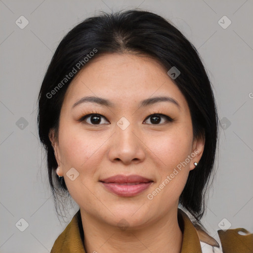 Joyful asian young-adult female with medium  black hair and brown eyes