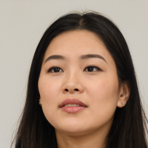 Neutral asian young-adult female with long  black hair and brown eyes