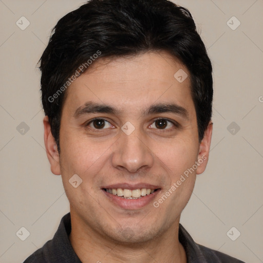 Joyful white young-adult male with short  black hair and brown eyes