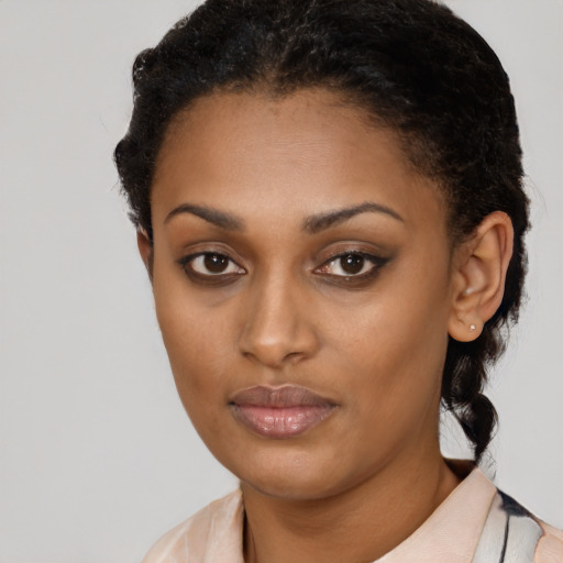 Neutral latino young-adult female with short  brown hair and brown eyes