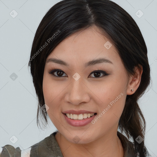 Joyful asian young-adult female with medium  brown hair and brown eyes