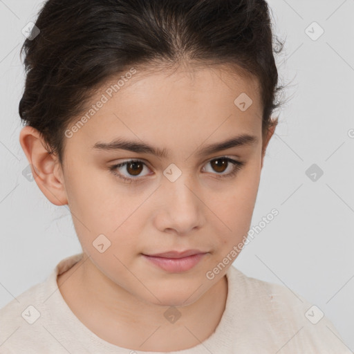 Joyful white child female with short  brown hair and brown eyes