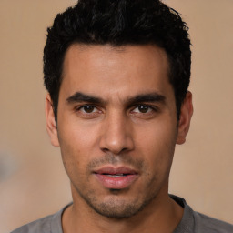 Neutral white young-adult male with short  black hair and brown eyes