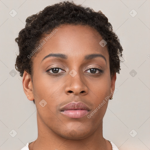 Neutral black young-adult female with short  brown hair and brown eyes