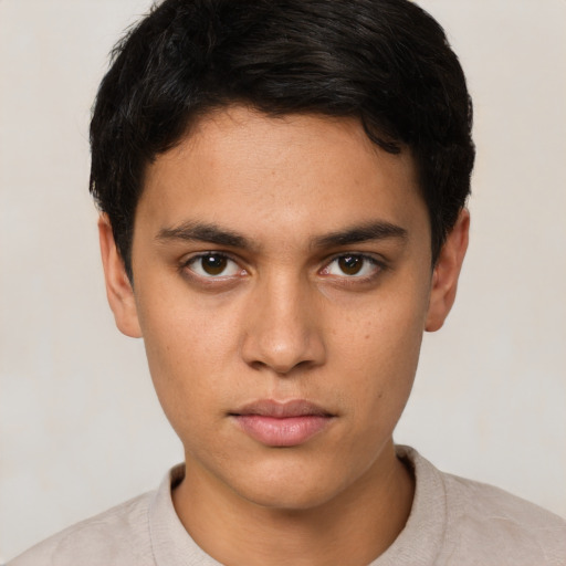 Neutral white young-adult male with short  black hair and brown eyes
