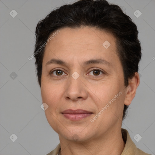 Joyful white adult female with short  brown hair and brown eyes