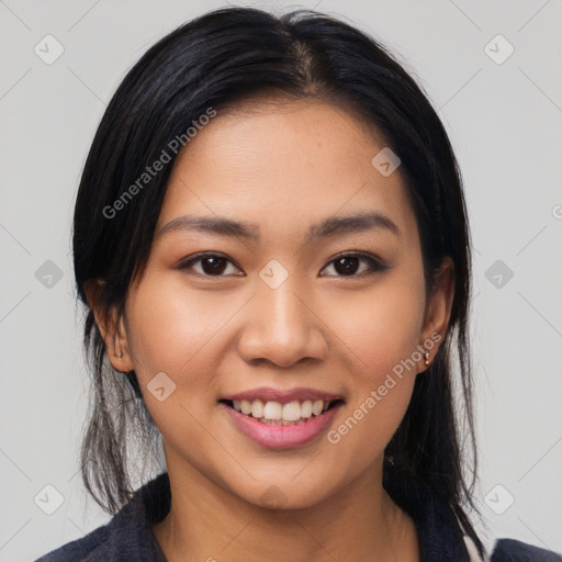 Joyful asian young-adult female with medium  black hair and brown eyes