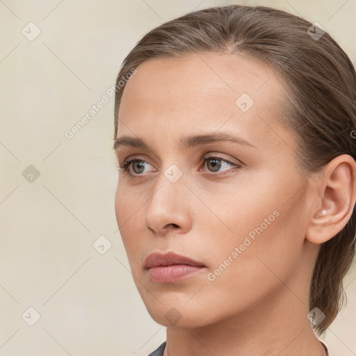 Neutral white young-adult female with medium  brown hair and brown eyes