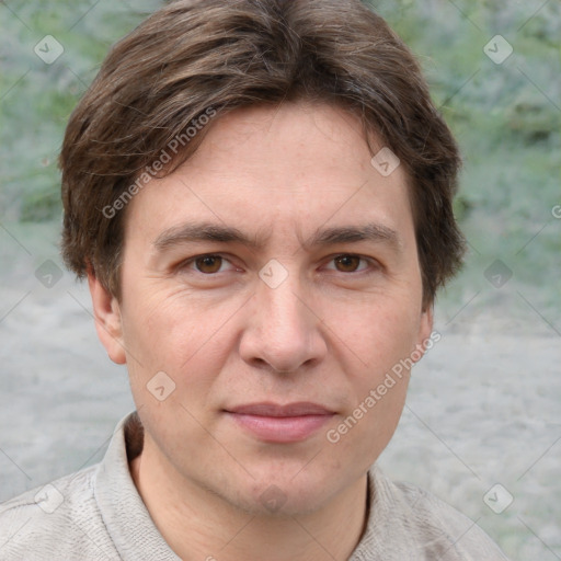 Joyful white adult male with short  brown hair and grey eyes