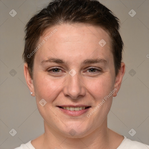 Joyful white adult female with short  brown hair and brown eyes