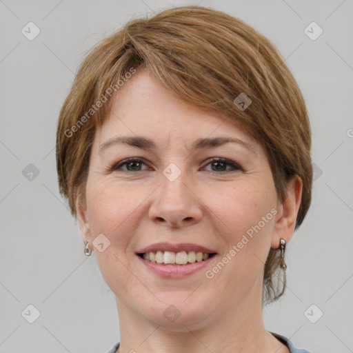 Joyful white young-adult female with medium  brown hair and grey eyes