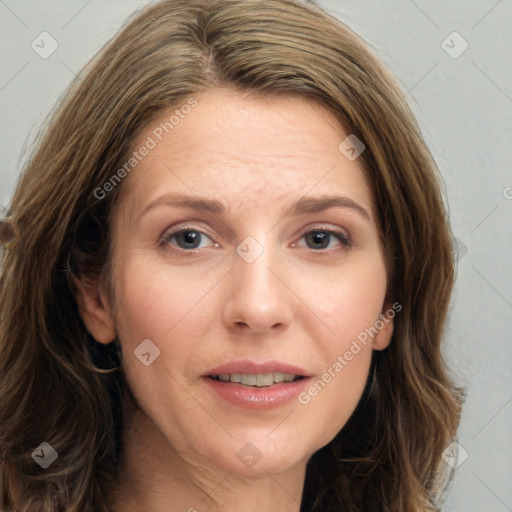 Joyful white young-adult female with long  brown hair and green eyes