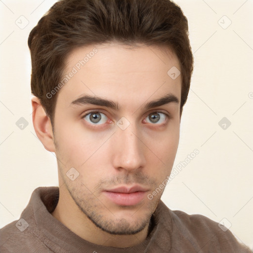 Neutral white young-adult male with short  brown hair and brown eyes