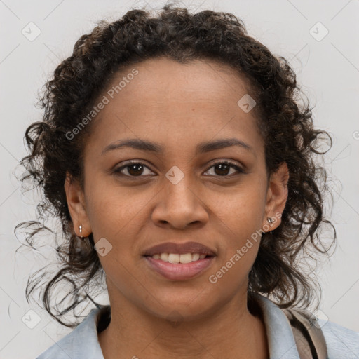 Joyful black young-adult female with medium  brown hair and brown eyes