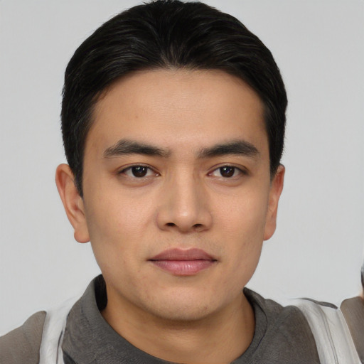 Neutral asian young-adult male with short  black hair and brown eyes