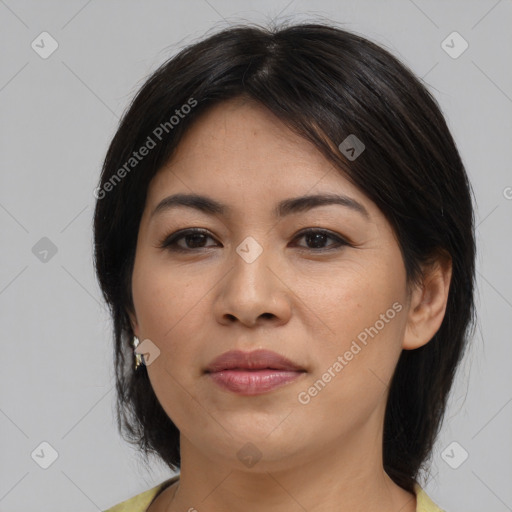 Joyful asian young-adult female with medium  brown hair and brown eyes