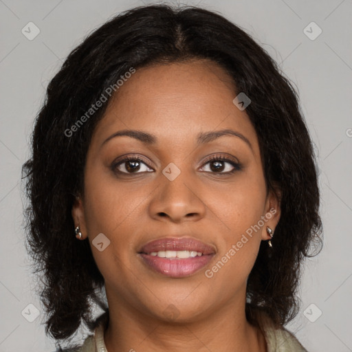 Joyful black young-adult female with medium  brown hair and brown eyes