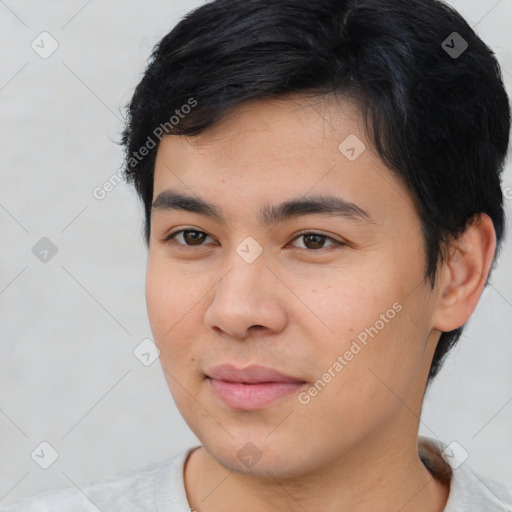 Joyful asian young-adult male with short  black hair and brown eyes