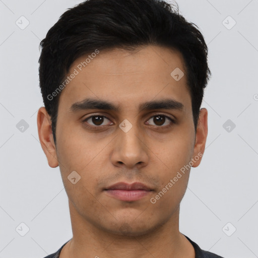 Neutral latino young-adult male with short  black hair and brown eyes