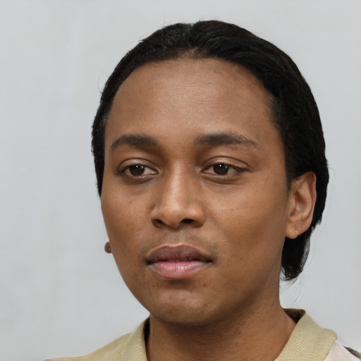 Neutral black young-adult female with short  black hair and brown eyes