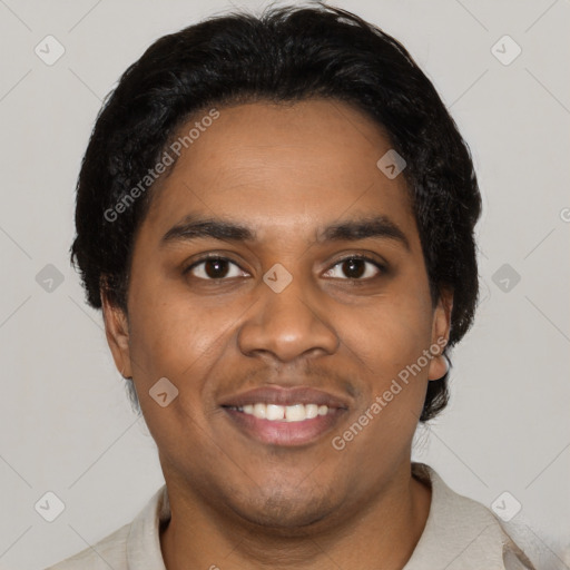 Joyful black young-adult male with short  black hair and brown eyes