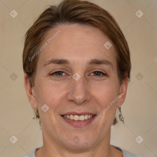 Joyful white adult female with short  brown hair and brown eyes