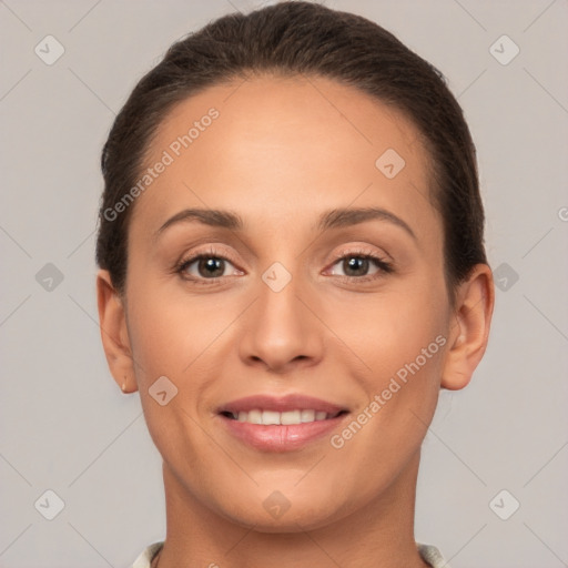 Joyful white young-adult female with short  brown hair and brown eyes