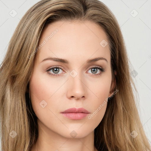 Neutral white young-adult female with long  brown hair and green eyes