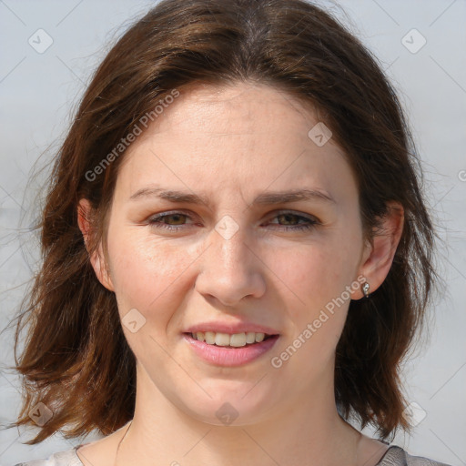 Joyful white adult female with medium  brown hair and brown eyes