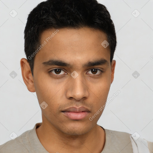 Neutral latino young-adult male with short  black hair and brown eyes