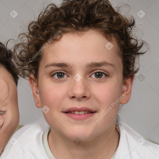 Joyful white child male with short  brown hair and brown eyes