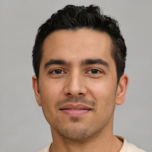 Neutral white young-adult male with short  black hair and brown eyes