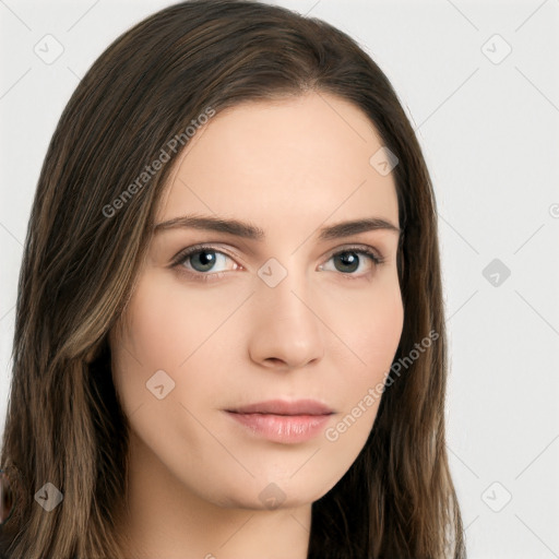 Neutral white young-adult female with long  brown hair and brown eyes