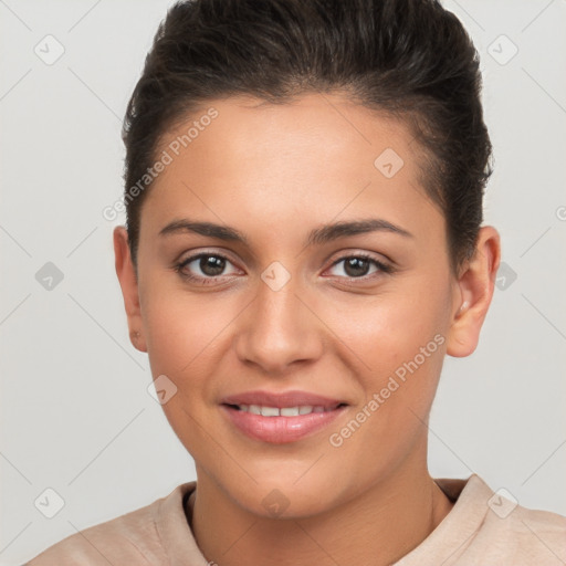 Joyful white young-adult female with short  brown hair and brown eyes