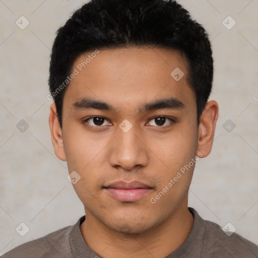 Neutral latino young-adult male with short  black hair and brown eyes