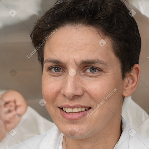 Joyful white adult female with short  brown hair and brown eyes