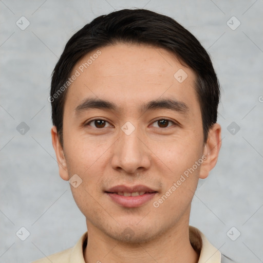 Joyful white young-adult male with short  black hair and brown eyes