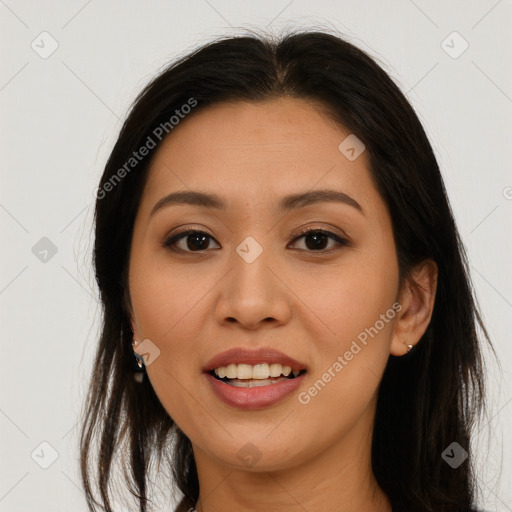 Joyful asian young-adult female with long  brown hair and brown eyes