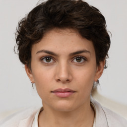 Neutral white young-adult female with short  brown hair and brown eyes